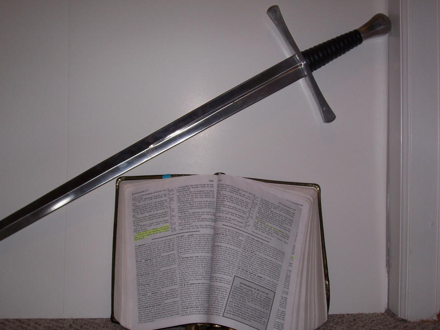a picture of a sword and a Bible